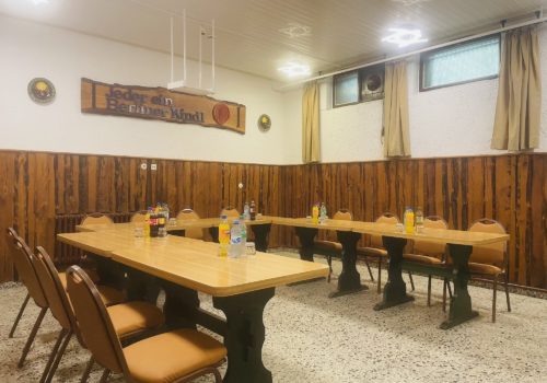 Ansicht des Seminarraums "Gedankenstube" mit Bestuhlungsvariante U-Tisch