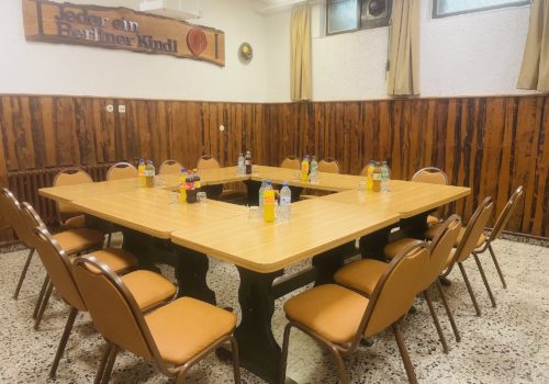 Ansicht des Seminarraums "Gedankenstube" mit Bestuhlungsvariante runder Tisch